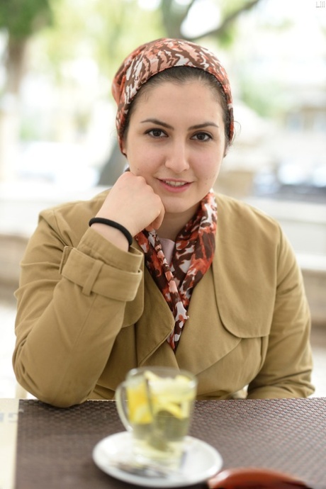 Brunette plumper shows her upskirt twat with a strand of pearls wedged in slit