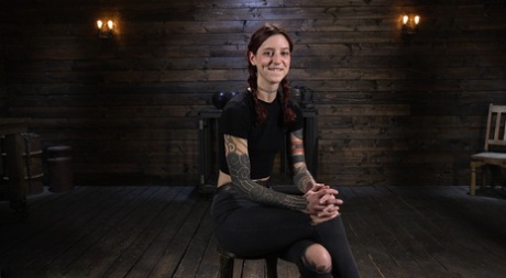 Submissive American Cam Damage gets spanked & toyed while bound